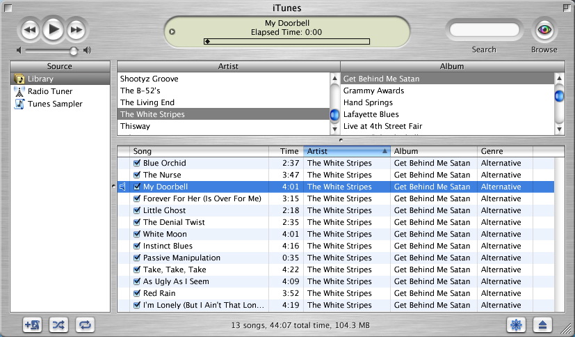 A screen shot of iTunes version 1.0, with three playback buttons